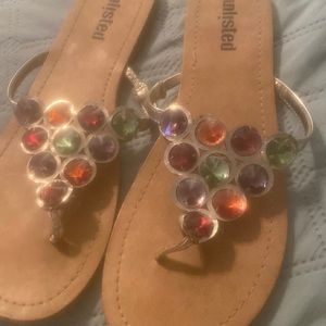 Multi colored stones on sandals